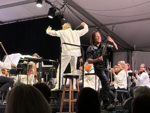 Bear Valley Music Festival Maestro Alexander Mickeltwate and virtuoso guitarist Scott Moughton of the local band the Star Dogs help conjure a "Stairway to Heaven" during last Saturday's “Our Earth, Our Stars and Beyond” program. Photo by Tori James