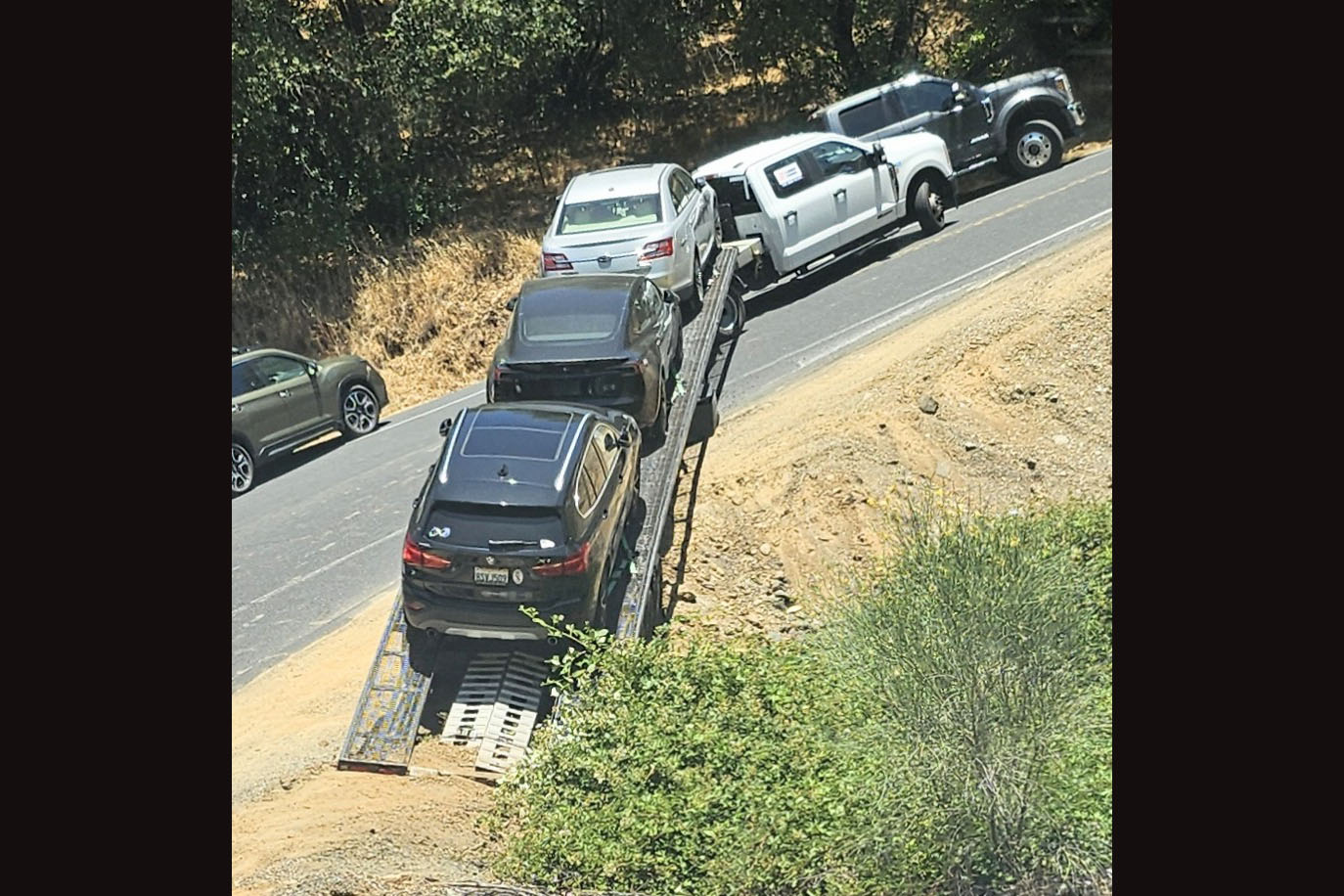 Truck Stuck At Hairpin Turn On HWY 49