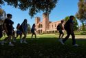 FILE—Students walk past Royce Hall at the University of California, Los Angeles, campus in Los Angeles, Aug. 15, 2024. (AP Photo/Damian Dovarganes, File)