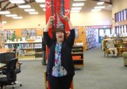 Tuolumne City branch librarian Gail Sorensen cheers Million Penny Challenge efforts.