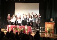 Photo by: BJ Hansen Michelle Allison speaks with the Sierra Waldorf Choir in the background