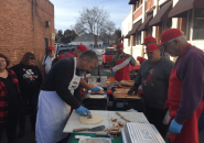 Photo by Tori James 32nd Annual Sonora Bean Feed with Tuolumne County Sportssmen prepping tortillas and garlic bread