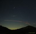 Photo by Jim Cruff Perseid meteor over New Melones Aug 10 2020 with CAL fire aircraft flight path creating red dotted line